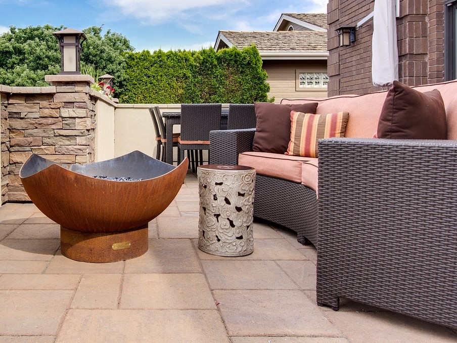 Firepit with sofa on an outdoor patio